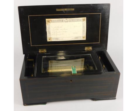 A late 19thC/early 20thC Swiss musical box, with brass cylinder playing four airs, numbered 27708, in rosewood and ebonised c
