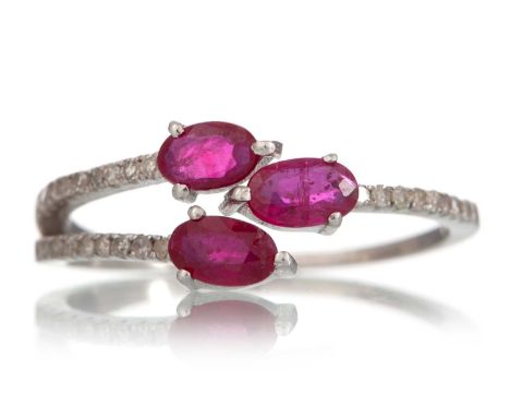 RUBY AND DIAMOND RING, set with oval rubies totalling approximately 0.80 carats, with diamonds totalling approximately 0.14 c