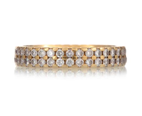 DIAMOND ETERNITY RING, EIGHTEEN CARAT GOLD, set with two rows of small round brilliant cut diamonds, in eighteen carat gold, 