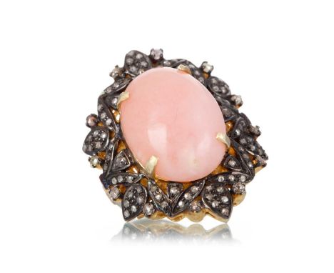 PINK OPAL AND DIAMOND RING, set with a cabochon pink opal of approximately 10.20 carats, within a halo of rose cut diamonds t