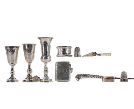 THREE EARLY 20TH CENTURY SILVER LIQUEUR CUPS, various maker's and assays, each bowl with stipple engraved decoration above a 