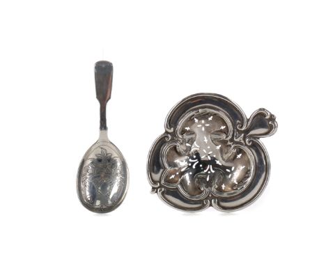 EDWARDIAN SILVER TEA STRAINER, maker John Round &amp; Son, Chester 1909, the pierced trefoil bowl with C-scroll rim, heart sh