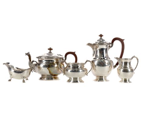 GEORGE VI SILVER FOUR-PIECE TEA AND COFFEE SERVICE, maker Alexander Scott, Birmingham 1935, comprising teapot, coffee pot, su