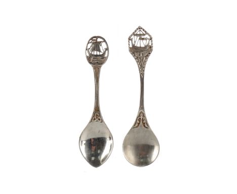 TWO ALEXANDER RITCHIE OF IONA SILVER PRESERVE SPOONS, Birmingham 1933, the first with oval finial pierced with a Viking ship,