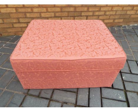 A Swanglen footstool with removable cushion opening to reveal a fold-out unused single bed 40 cm x 85 cm x 67 cm