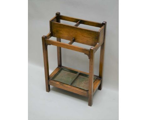 A LATE 19TH / EARLY 20TH CENTURY OAK UMBRELLA &amp; STICK STAND fitted with original drip tray, 70cm x 46cm 