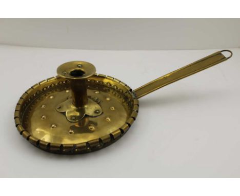 AN ARTS &amp; CRAFTS DESIGN BRASS CHAMBER STICK, base 20cm diameter 