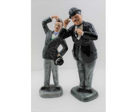 A PAIR OF ROYAL DOULTON CERAMIC FIGURES, "Stan Laurel &amp; Oliver Hardy", 1990 limited edition, both 594 of 9500, with certi