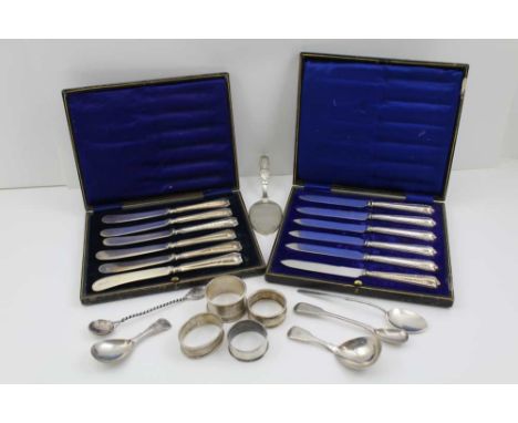 A QUANTITY OF MISCELLANEOUS SILVER, to include; two caddy spoons, four napkin rings, two cased sets of silver handled tea kni