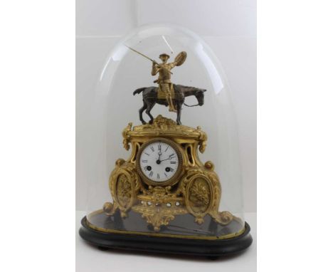 A 19TH CENTURY CONTINENTAL MANTEL CLOCK, gilt spelter cast frame with Don Quixote upon Rocinante mount, white enamel dial wit