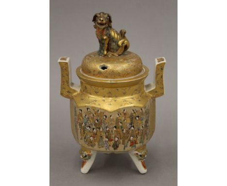 A 19th century Japanese satsuma pottery lidded koro decorated with figures and geometric designs and seated dog finial, scrip