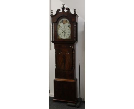 An early 19th century mahogany eight-day long case clock with painted dial. 245 cm high.