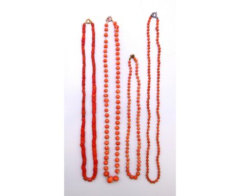 Four coral necklaces.  Longest 48 cm long. 