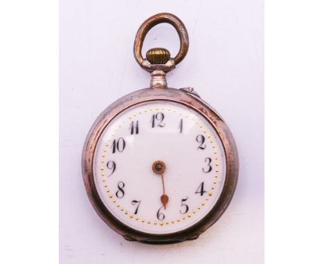 A silver fob watch.  3 cm diameter. 