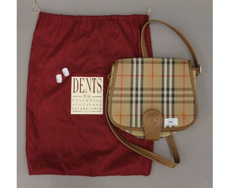 A Burberry canvas and leather handbag. 27 cm wide.