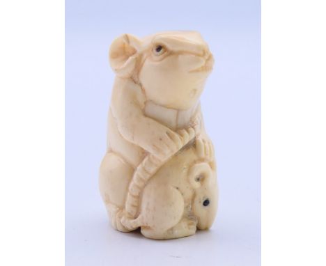 A bone netsuke in the form of two rats.  5 cm high. 