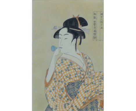 A Japanese wood block print, framed and glazed. 18 x 28.5 cm.
