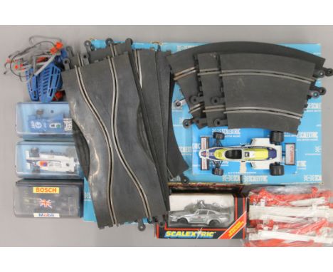 A quantity of Scalextric, track a vehicles, some boxed.