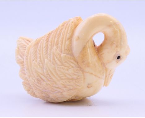 A bone swan form netsuke.  3.5 cm high. 