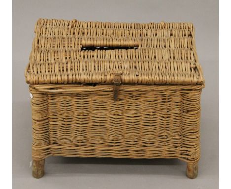 A wicker fishing basket. 47 cm wide x 34 cm high.
