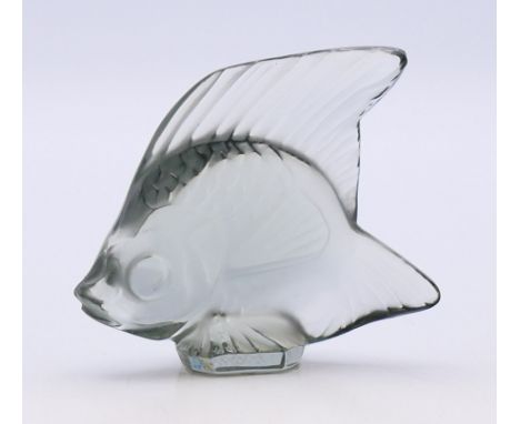 A Lalique grey glass fish, signed Lalique R France and with paper label applied to base numbered 30014.  4.5 x 5.3 x 2.1 cm.