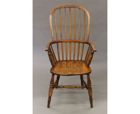 A 19th century stick back Windsor chair. 55 cm wide.