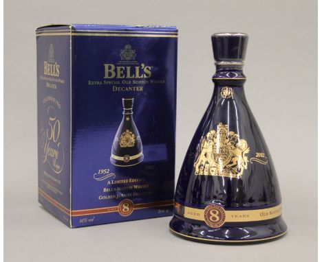A  boxed 70 cl Bell's Extra Special Old Scotch whisky decanter. 