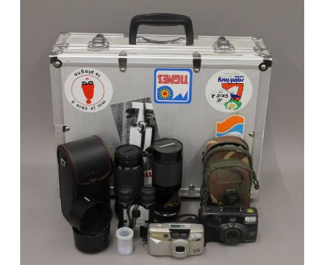 A quantity of various photographic equipment including cameras (Canon, Pentax), lenses (Sigma, Tamron), a boxed tripod etc. T