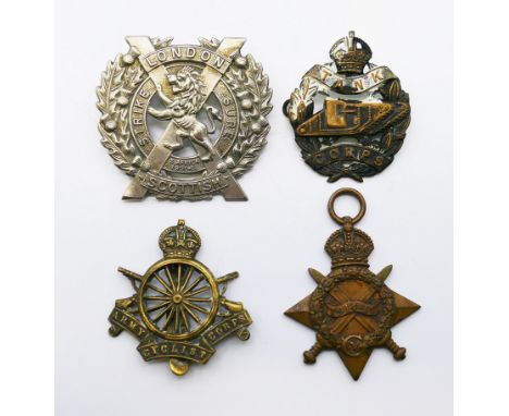 A WWI 1914-15 Star medal awarded to 12421 Pte W Stoker Durh LI, and three cap badges (Tank Corps, Army Cyclist Corps and Lond