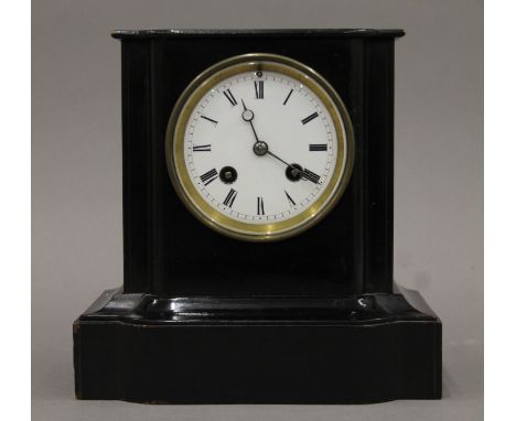 A 19th century French ebonised mantle clock, the inner door case with label for Camerer, Kuss, Tritschler & Co. 20 cm high.