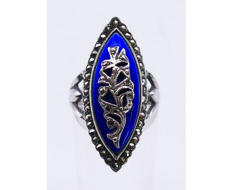 A silver, blue enamel and marcasite ring. Ring size O.