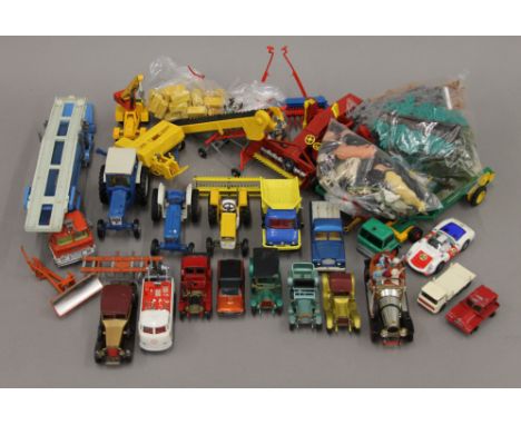 A quantity of various diecast and plastic Britains farm machinery and accessories and a quantity of other diecast vehicles in