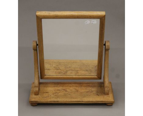 A Victorian ash freestanding dressing table mirror. 46 cm wide x 52 cm high.