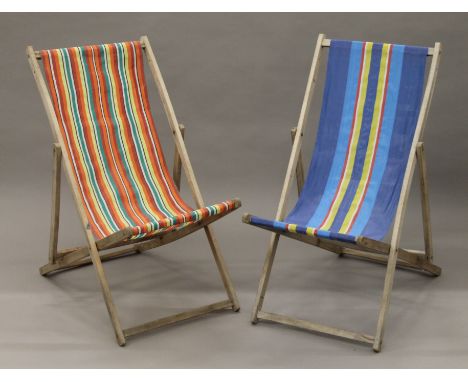 Two vintage deckchairs. 55 cm wide.