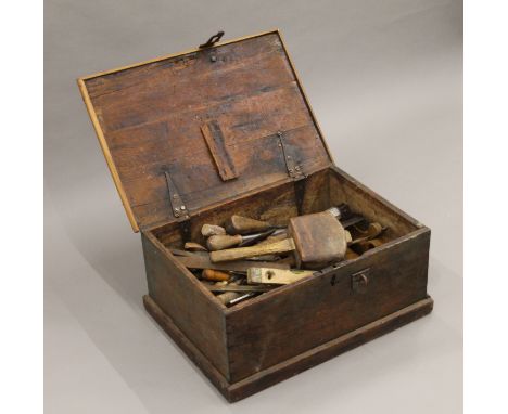 A pine tool box containing tools. 57 cm wide x 26 cm high. 
