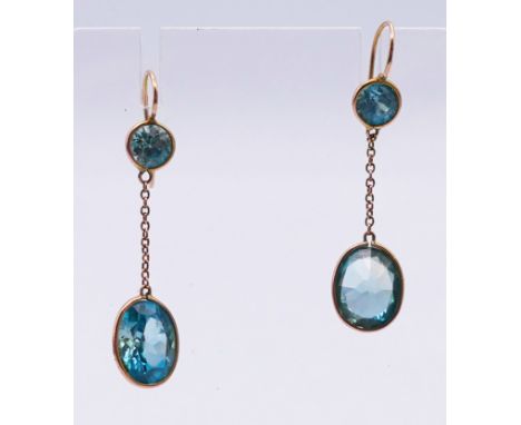 A 9 ct gold and blue stone ring. 2.8 grammes total weight. Ring size R/S. Together with a necklace and a pair of earrings.  N