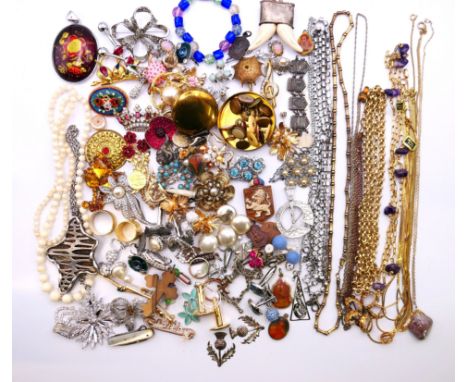 A box of jewellery to include brooches, necklaces, earrings, bracelets, cufflinks, shirt studs, etc.