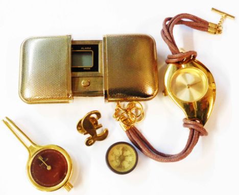 Two modern goldtone cased watches, folding digital clock, small compass and pin