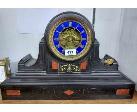 A late Victorian black slate and red marble inlaid cased mantel clock with blue enamelled chapter ring and visible works to d