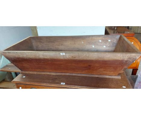 A 1.3m old wooden dough trough with dovetailed sloping sides - minor damage to one corner