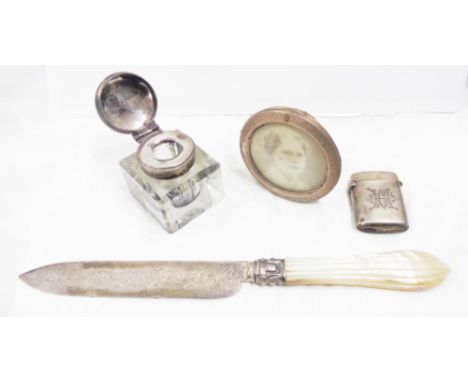 A glass inkwell with silver flip-top lid - sold with a silver knife with mother-of-pearl handle, small circular photograph fr