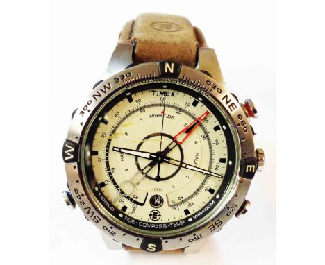 A Timex Indiglo sports watch with temperature, compass and tide detail, with battery movement