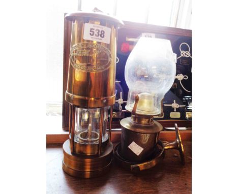 A vintage brass miner's lamp with plate for E. Thomas &amp; Williams Ltd. makers, Aberdare - sold with a gimbal mounted small