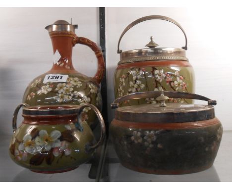 Four pieces of 19th Century Watcombe pottery in the Apple Blossom pattern comprising  pottery ewer of globe form with silver 