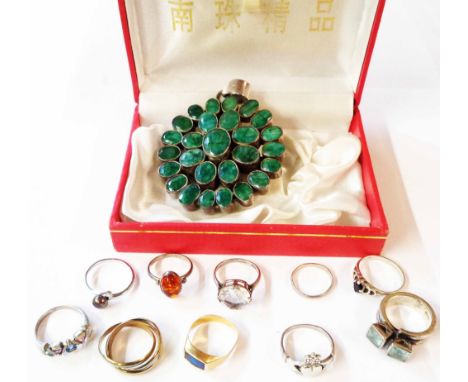 A collection of 925 and other white metal rings, also an unmarked yellow metal ring with blue enamelled centre - sold with a 