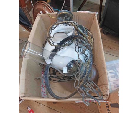 A box containing a pair of hanging glass ceiling lights of oil lamp form with clear glass chimneys and opaque glass shades - 