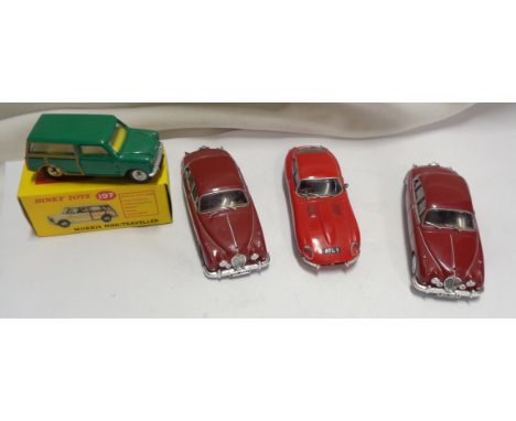 A bag containing a boxed Dinky Morris Mini-Traveller 197 reissue and three Jaguar models