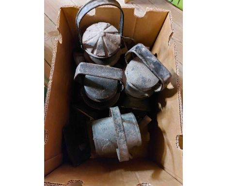 Three old railway oil lanterns with revolving red and green filters, each marked B.R. - sold with another hand lantern (a/f) 