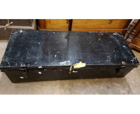A vintage Royal Navy officer's tin trunk with black japanned finish and keys