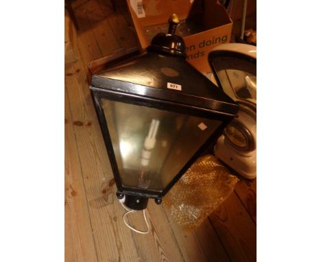 An outside light of street lamp form with perspex panels and brass makers plaque for D.W. Windsor